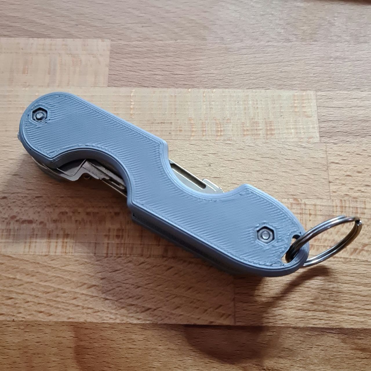 Remixed Swiss Key Holder with hole for a ring