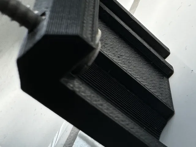 Shower door roller bracket