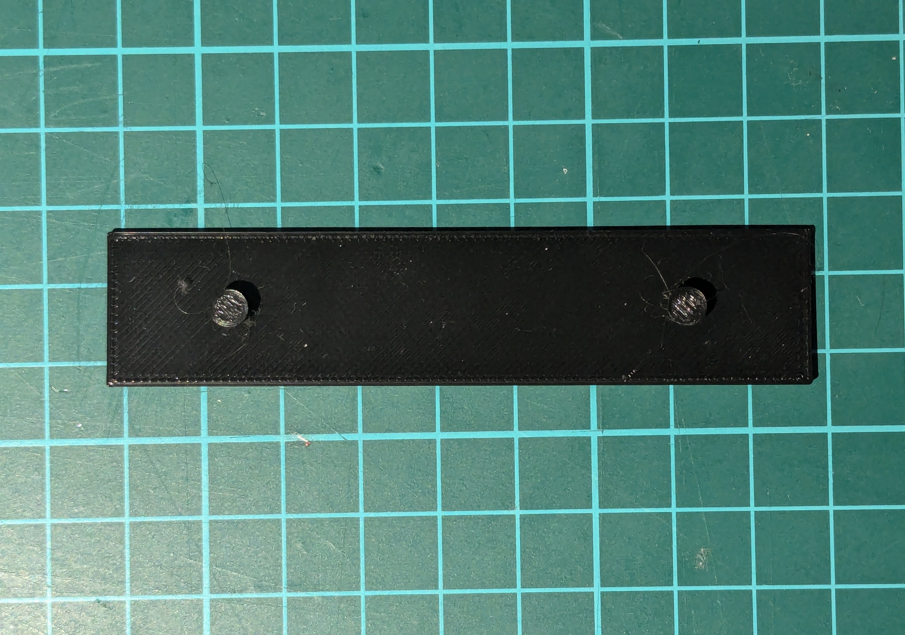 Ethernet Switch Wall Mount Bracket [DLink DES-105; 58mm Pitch, 3mm Studs]