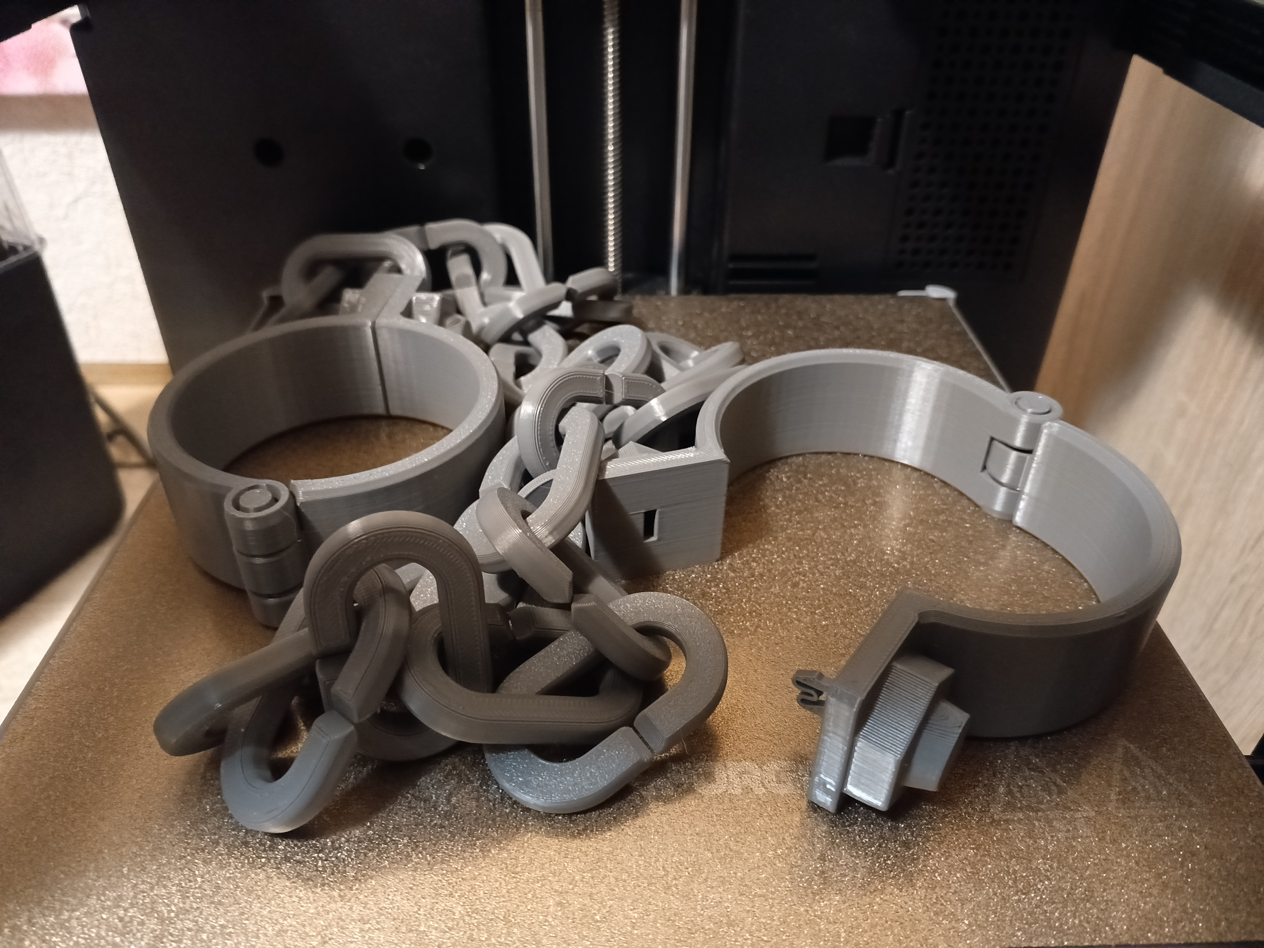 Handcuffs, shackles with a large chain