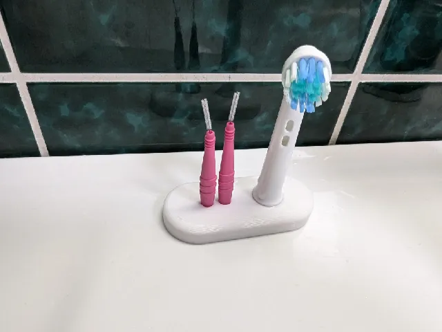 Holder for electric toothbrush head