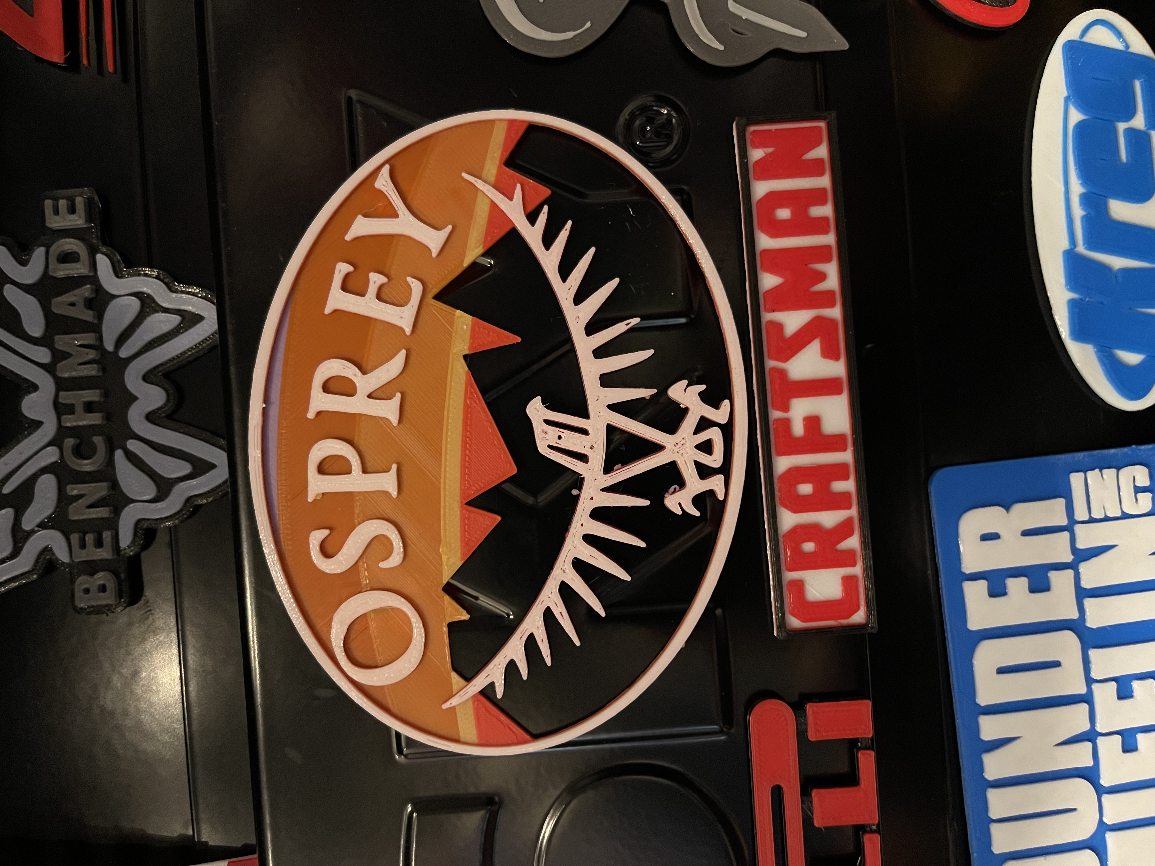 osprey company logo (with sunset behind mountains background)