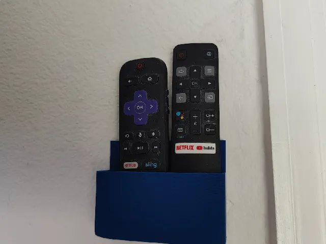Dual wall mounted remote holder