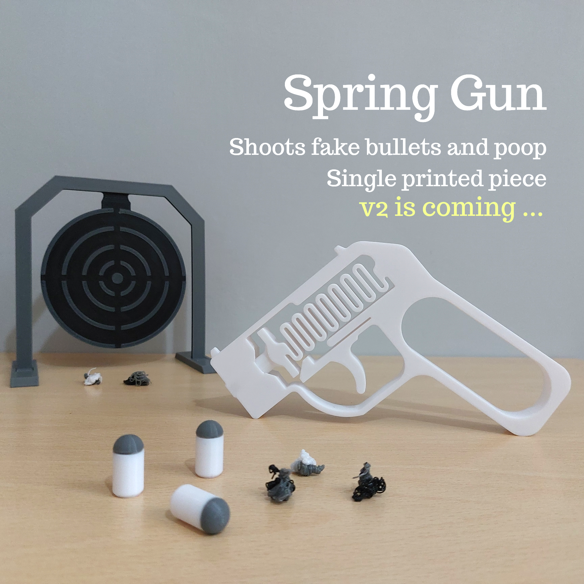 Spring Gun - Shoots fake bullets and poop