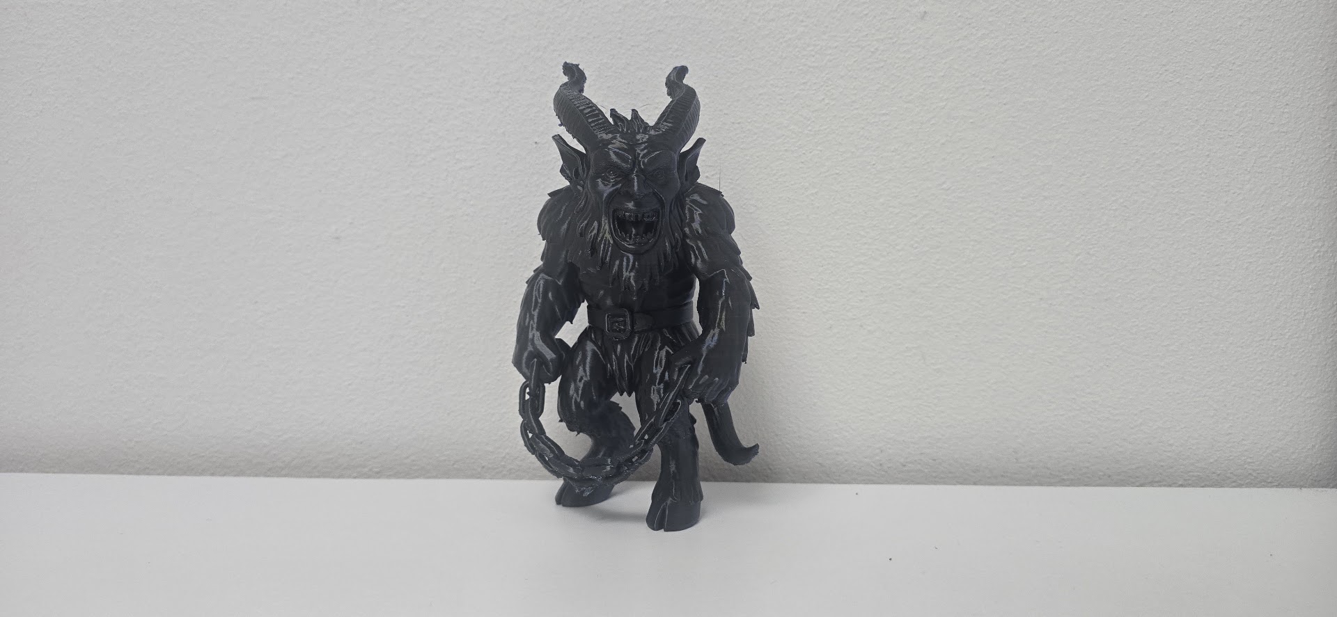 Furry Krampus with Chains Holiday Figurine