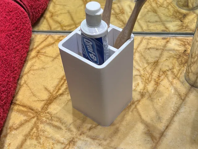 Toothbrush and paste organizer