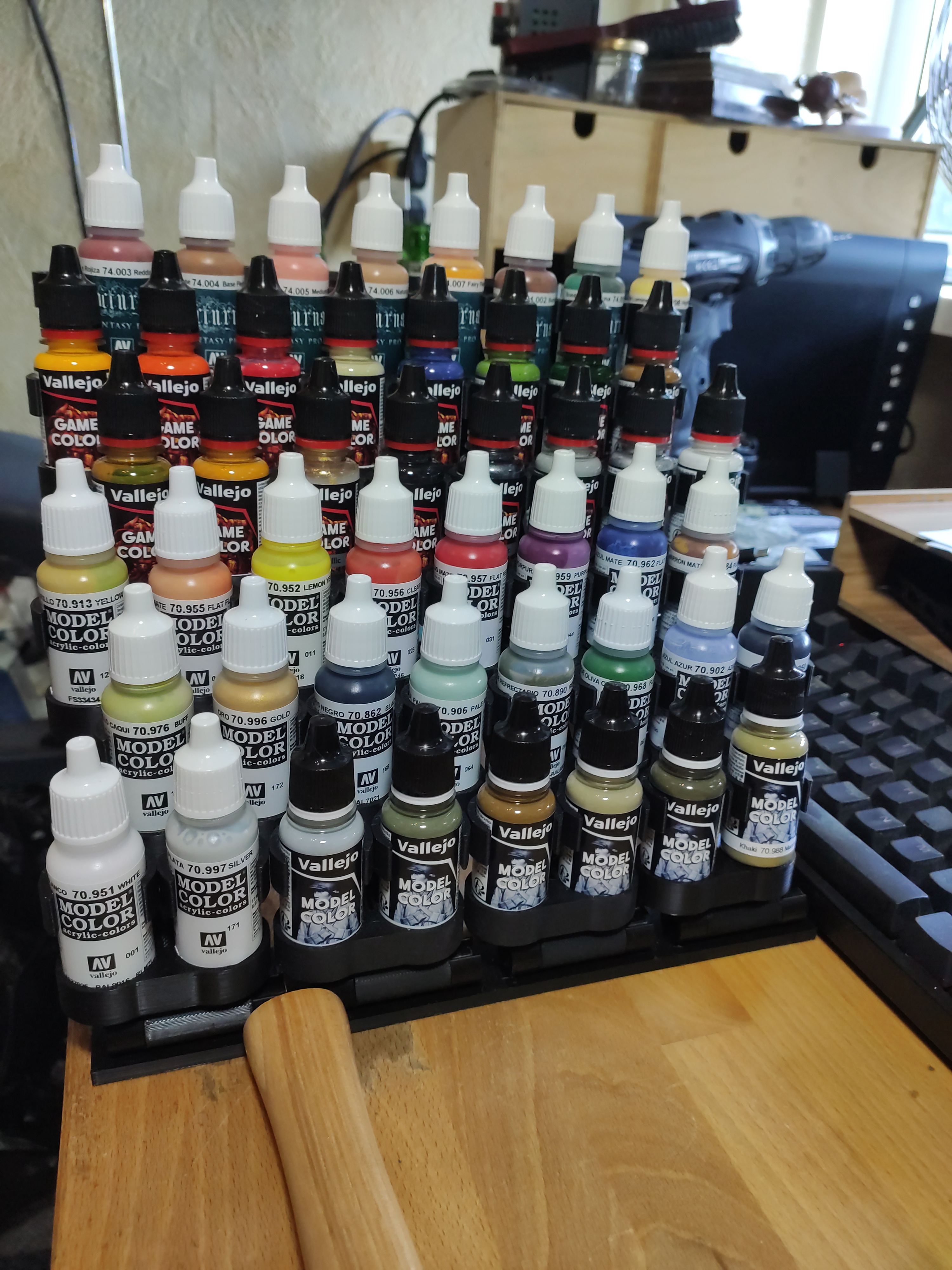 Modular folding paint bottle rack