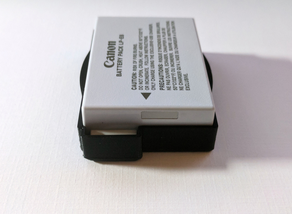 Canon Camera Battery Cover by Zemba Craftworks Download free STL