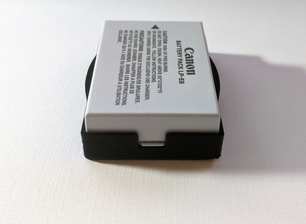 Canon Camera Battery Cover by Zemba Craftworks Download free STL