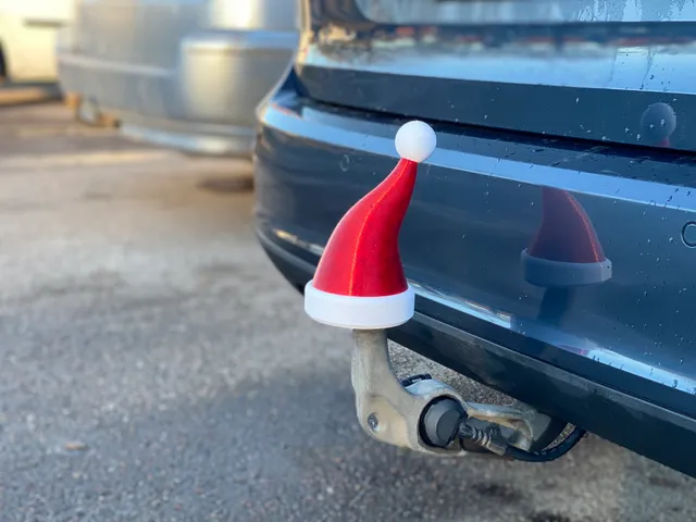 Santa Hat for tow bar of car (secured). Hitch cover