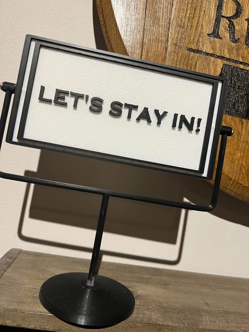 Let's Stay In / Let's Go Out Sign