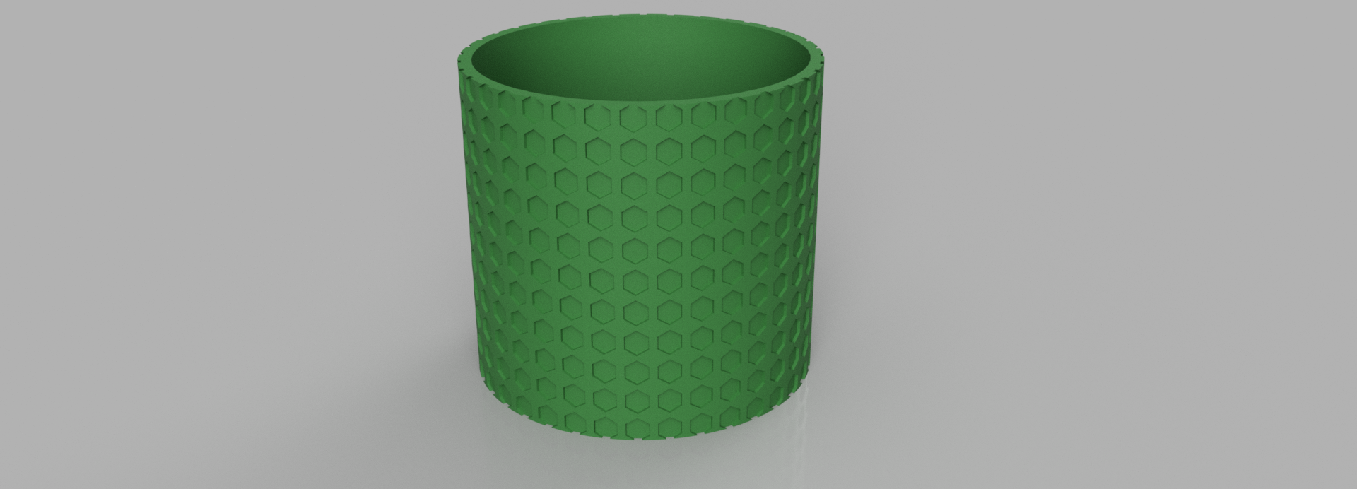 Plant pot with a hexagonal pattern