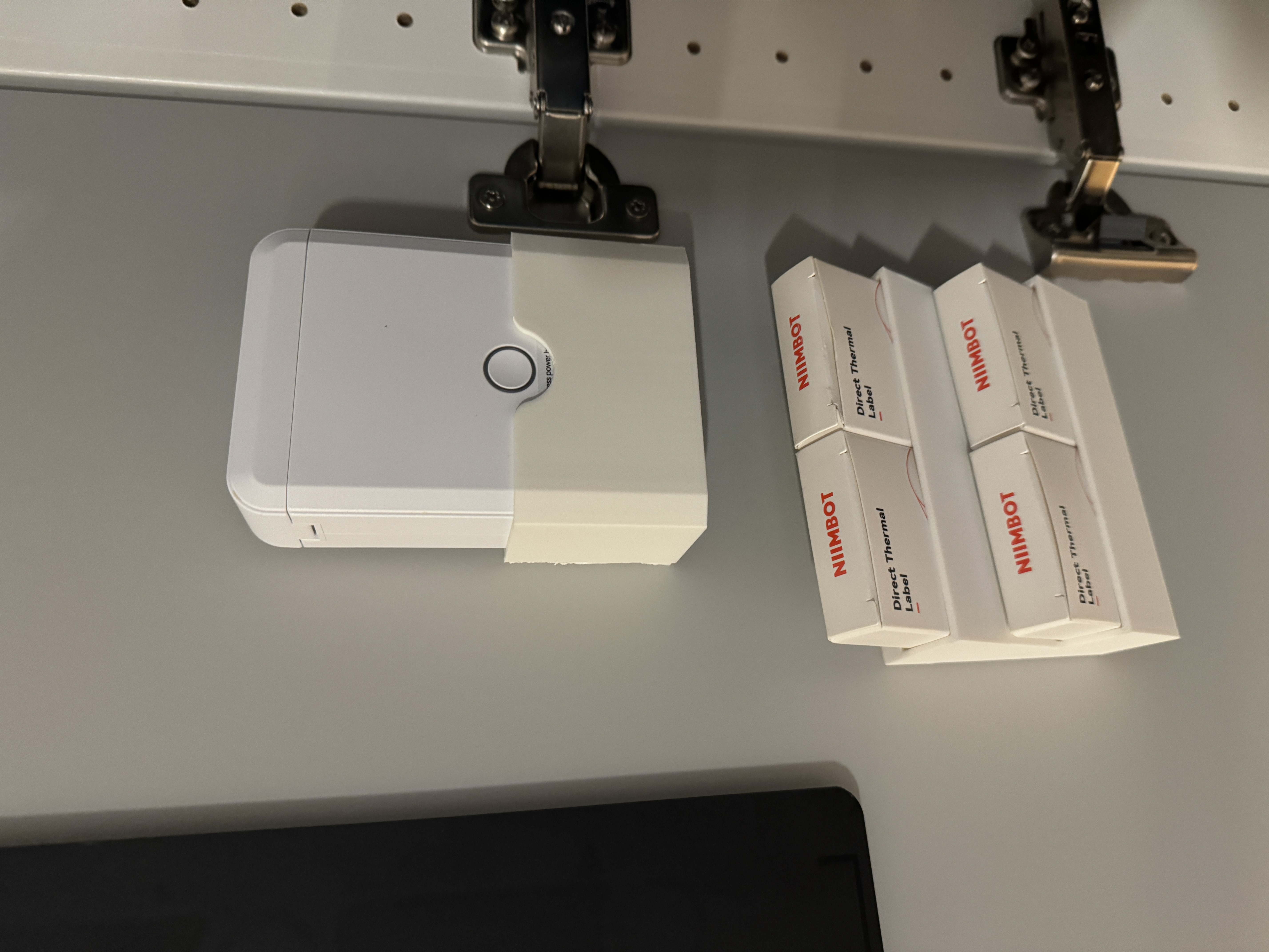 NIIMBOT D110 wall mount and roll holder
