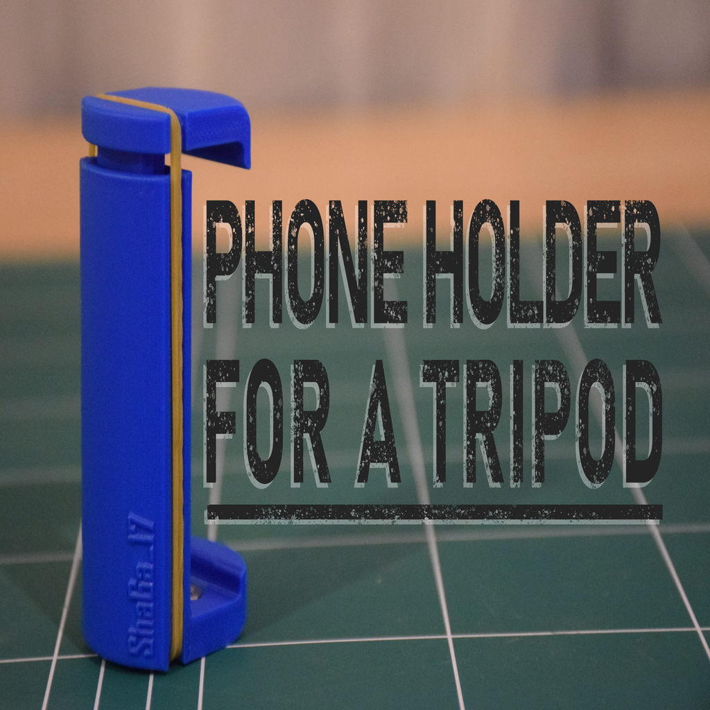 Phone holder attachment for a tripod 