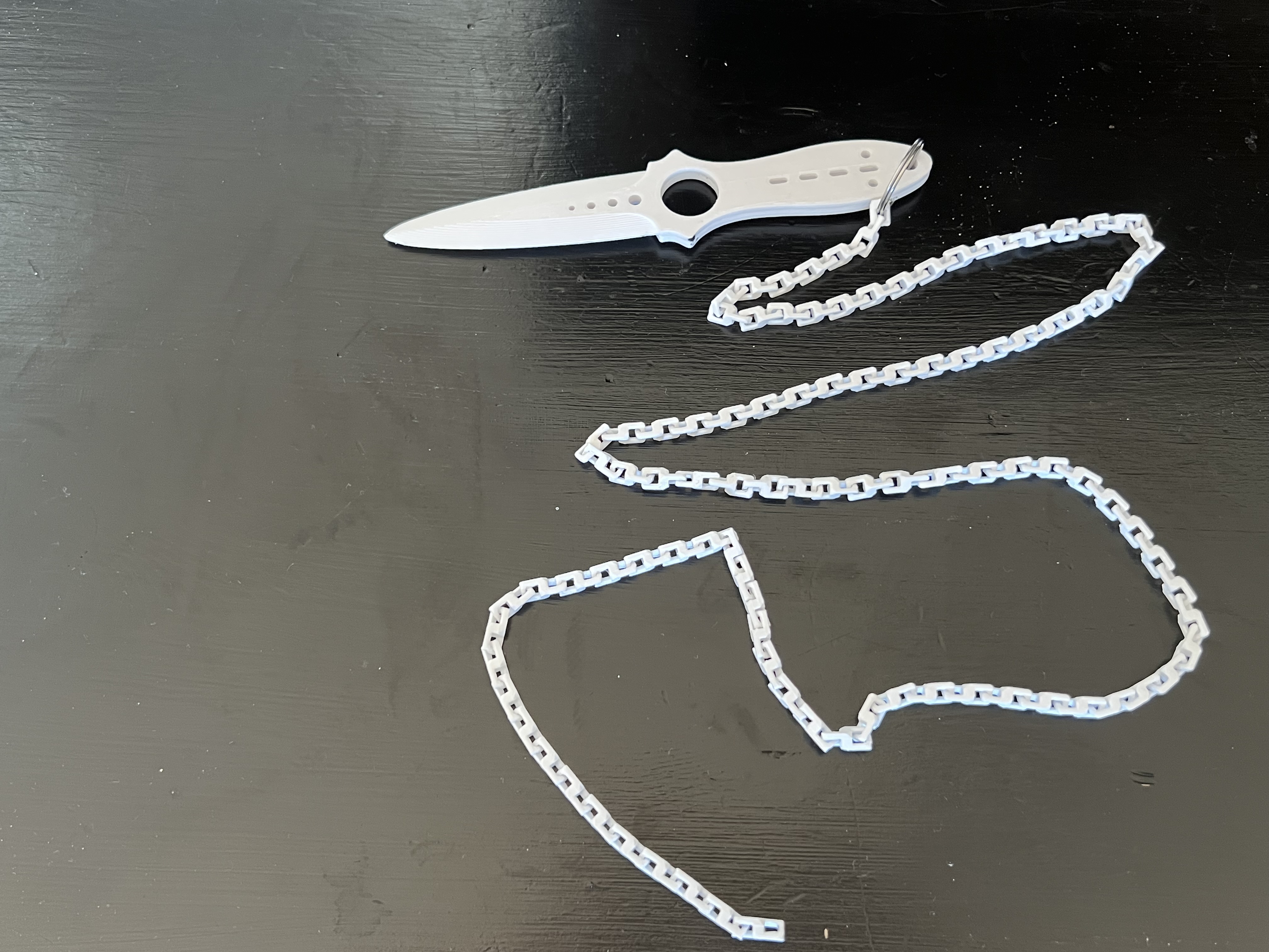 knife with long chain