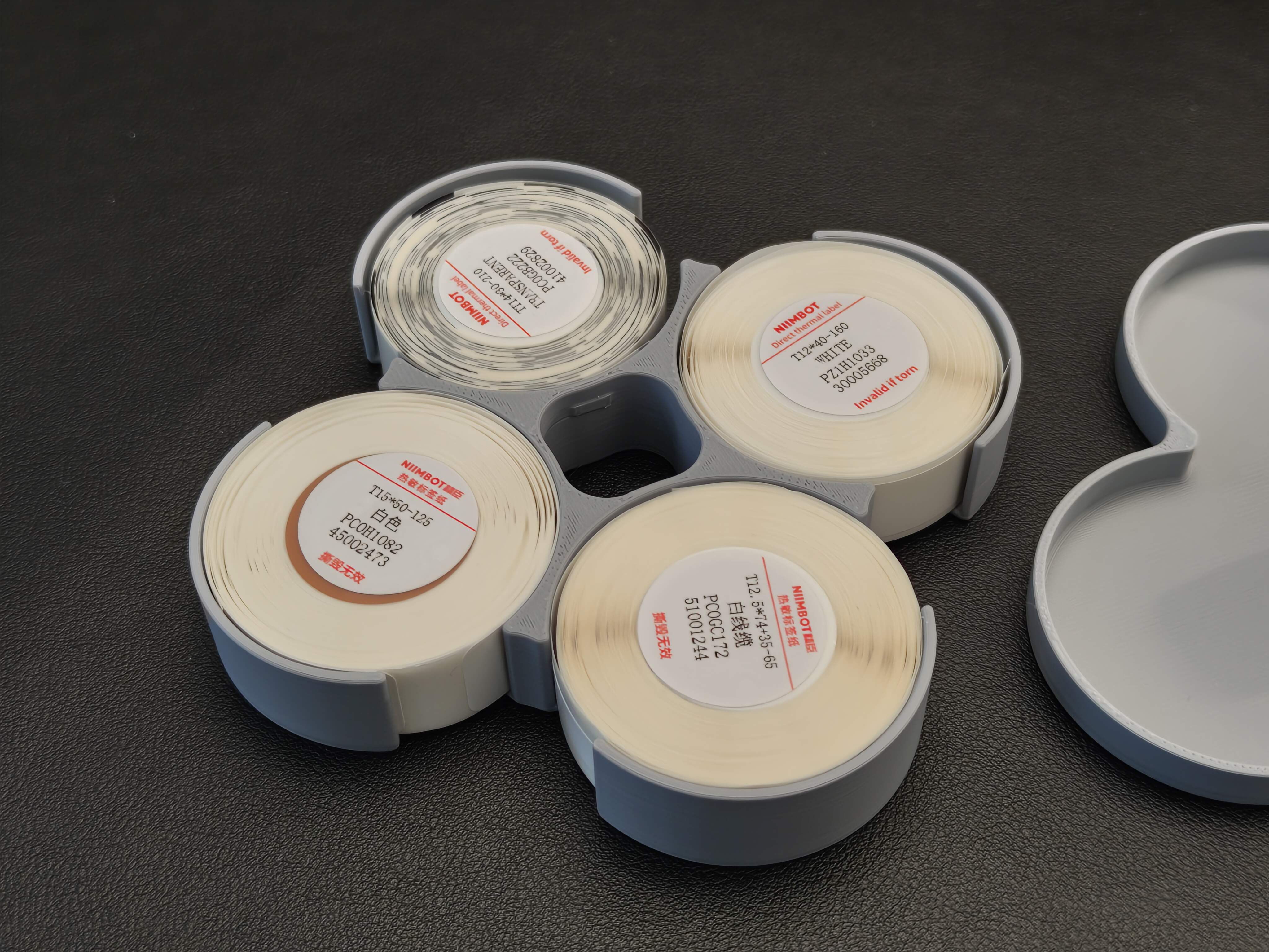 Niimbot label case with finger holes