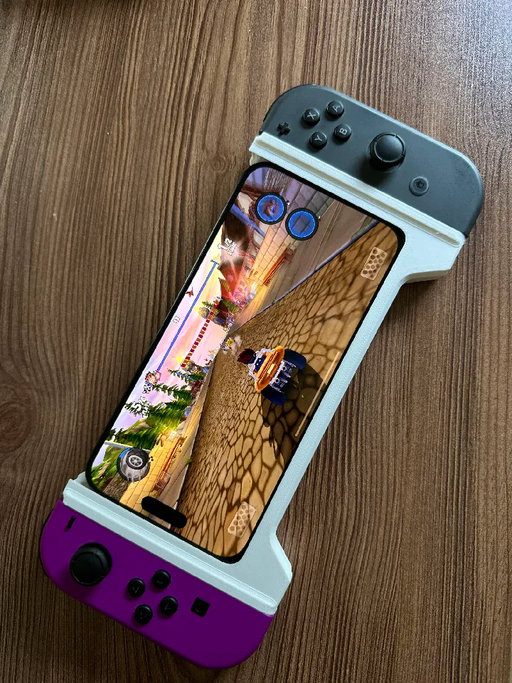 Nintendo Switch JoyCon grip for iPhone 15 Pro Max by PhiLan92