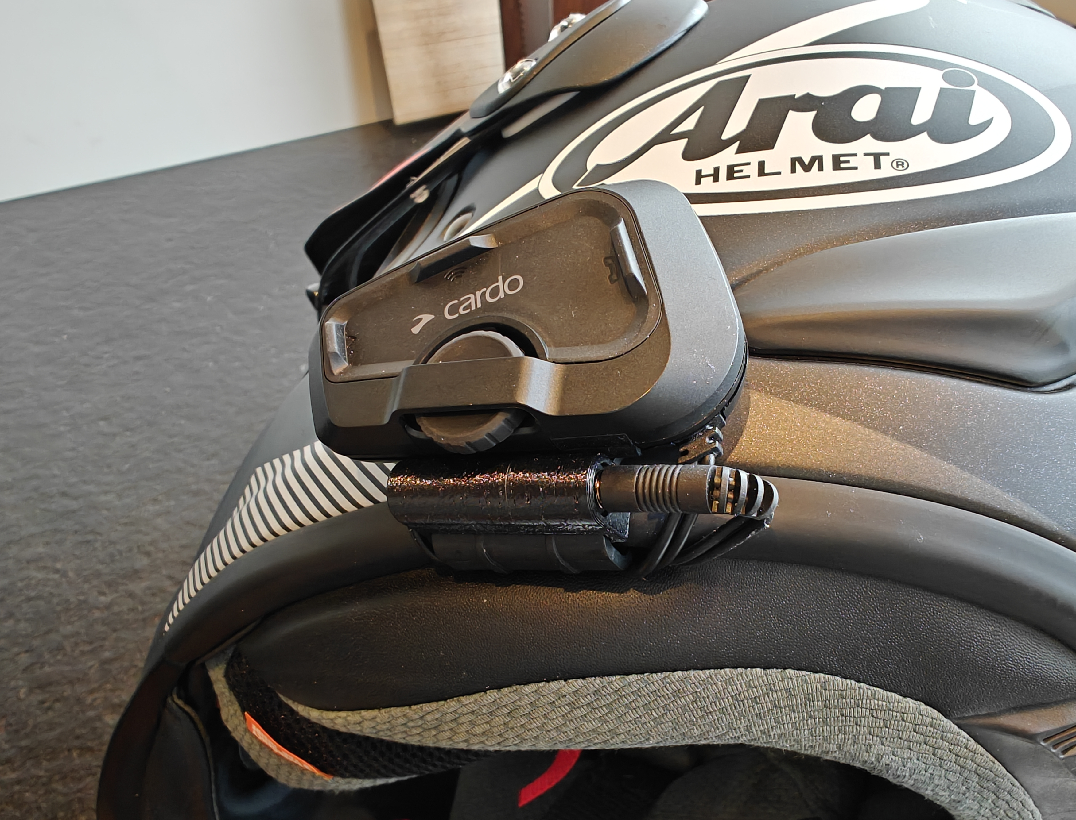Cardo comms headphones aux plug mount