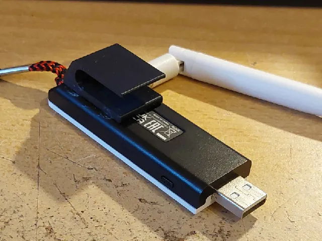 Wifi dongle hook (glue-on)