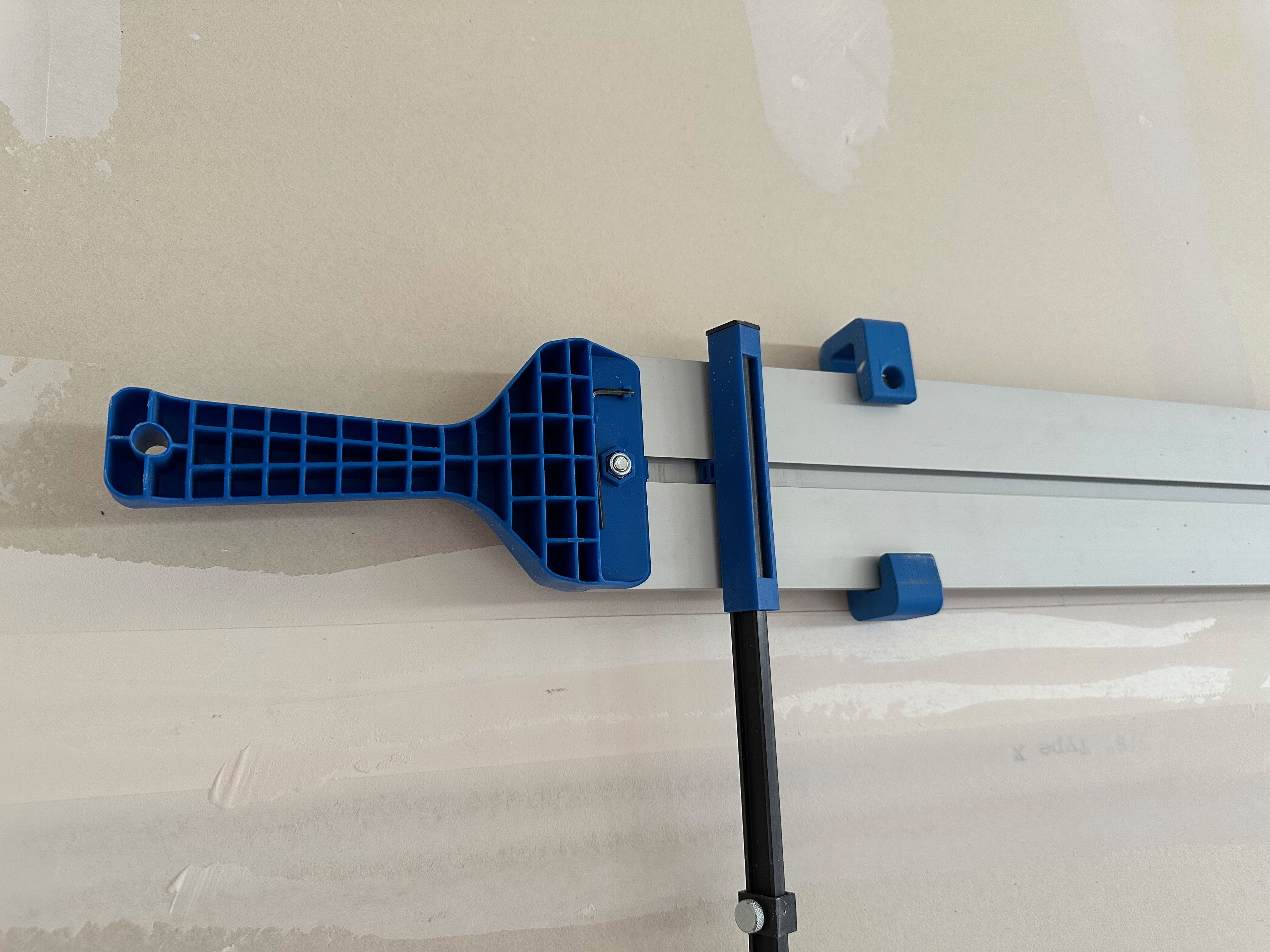 Wall Hanger for Circular Saw Straight Edge Guide