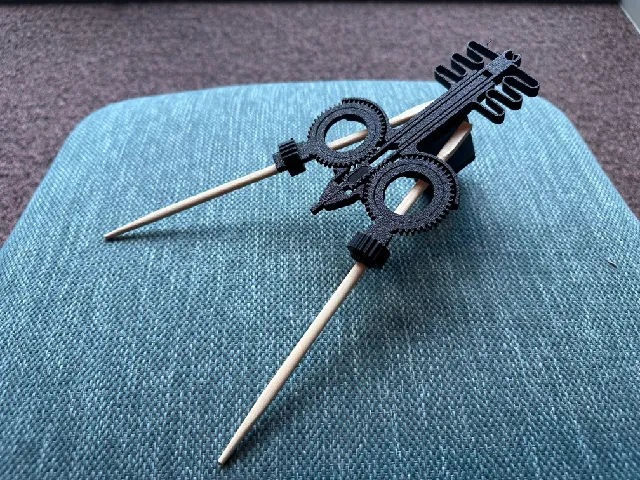 Gun-style chopstick helper