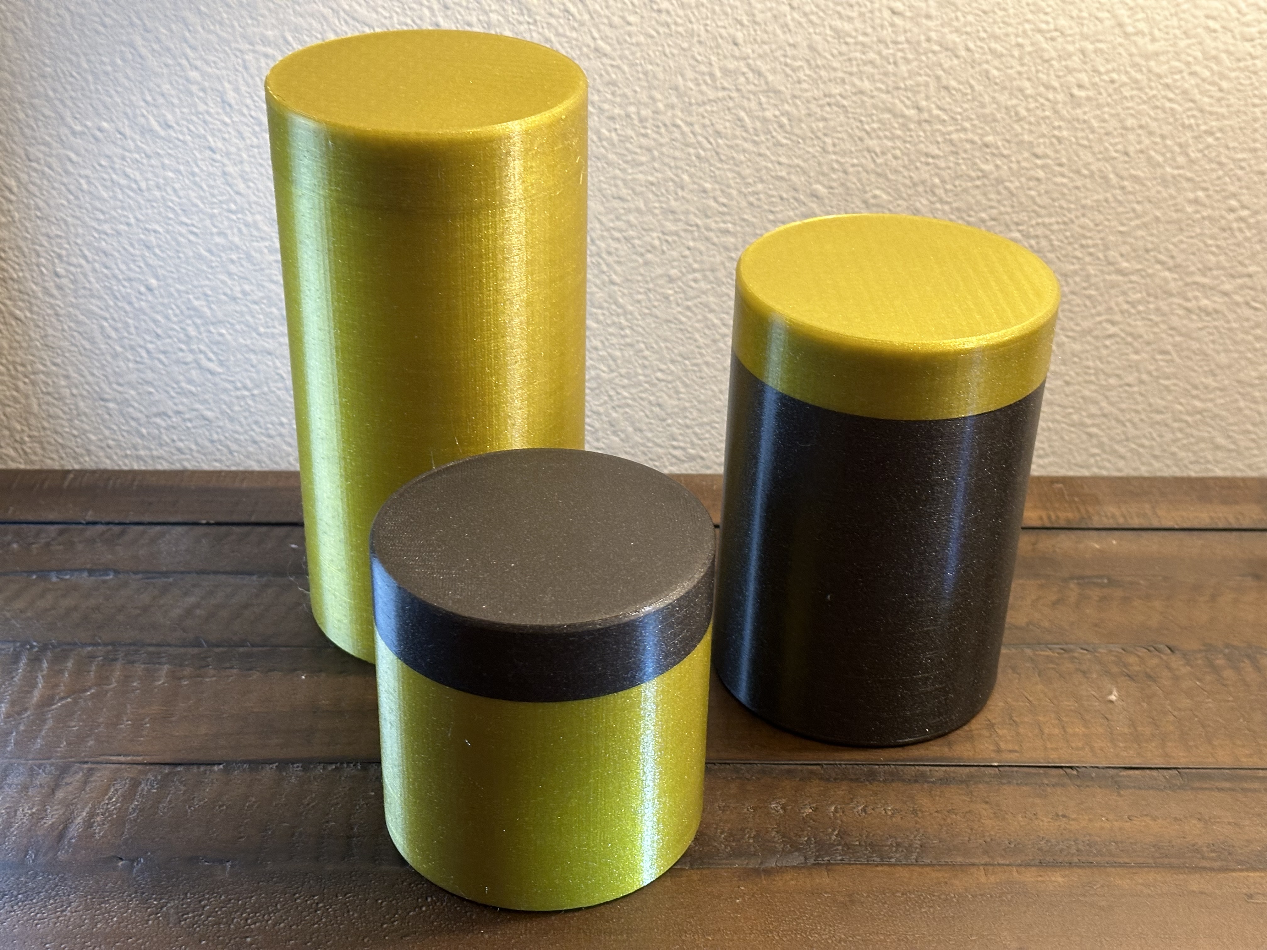 Canisters with screw on tops.