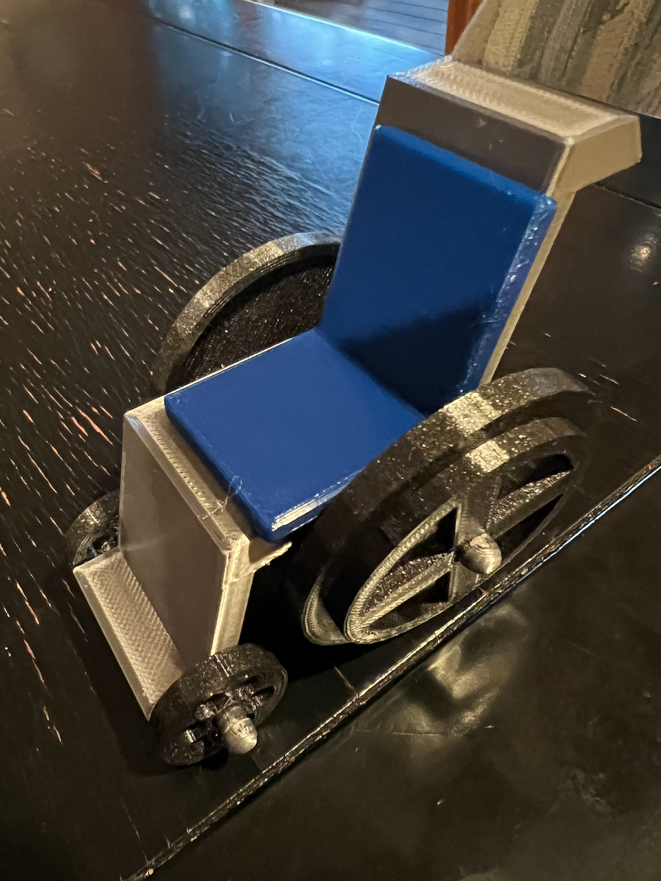 Toy wheelchair