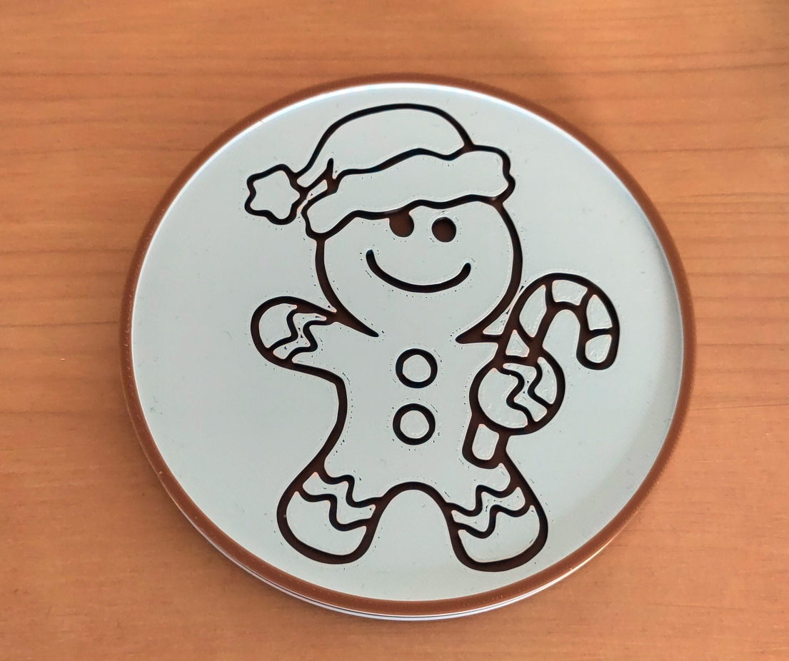 Gingerbread man christmas coaster (100mm diameter, filament swap)
