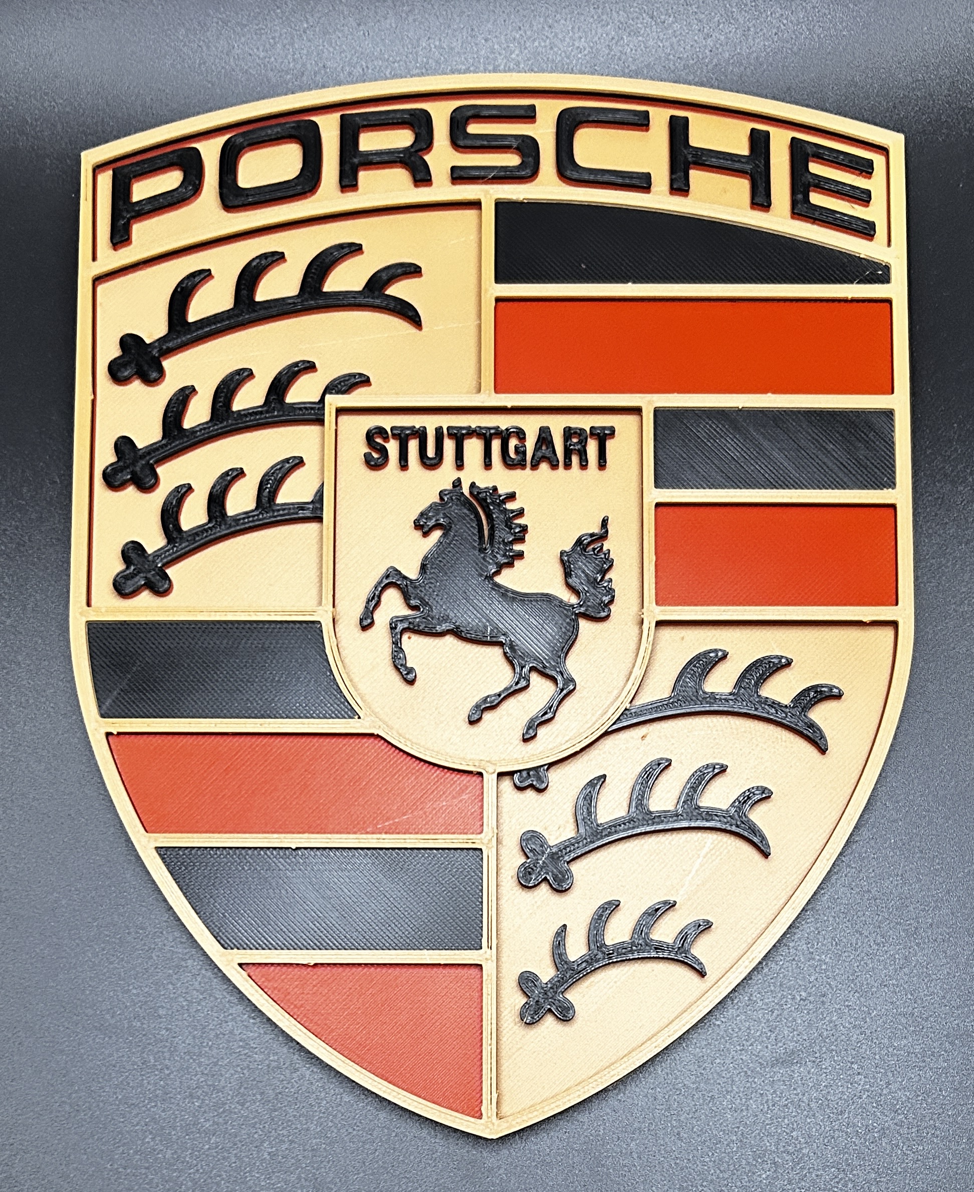 Porsche logo-AXM