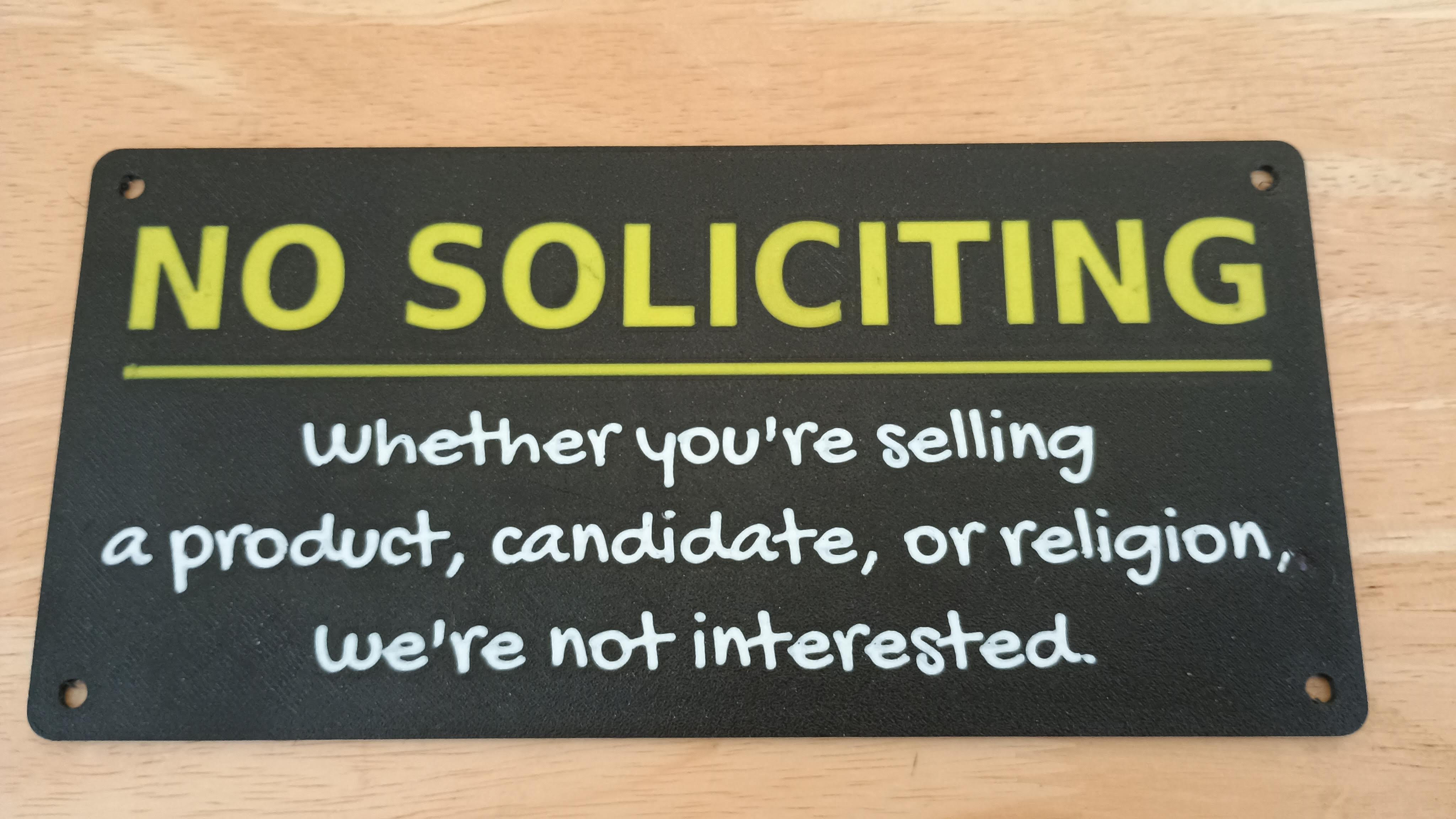 NO SOLICITING sign