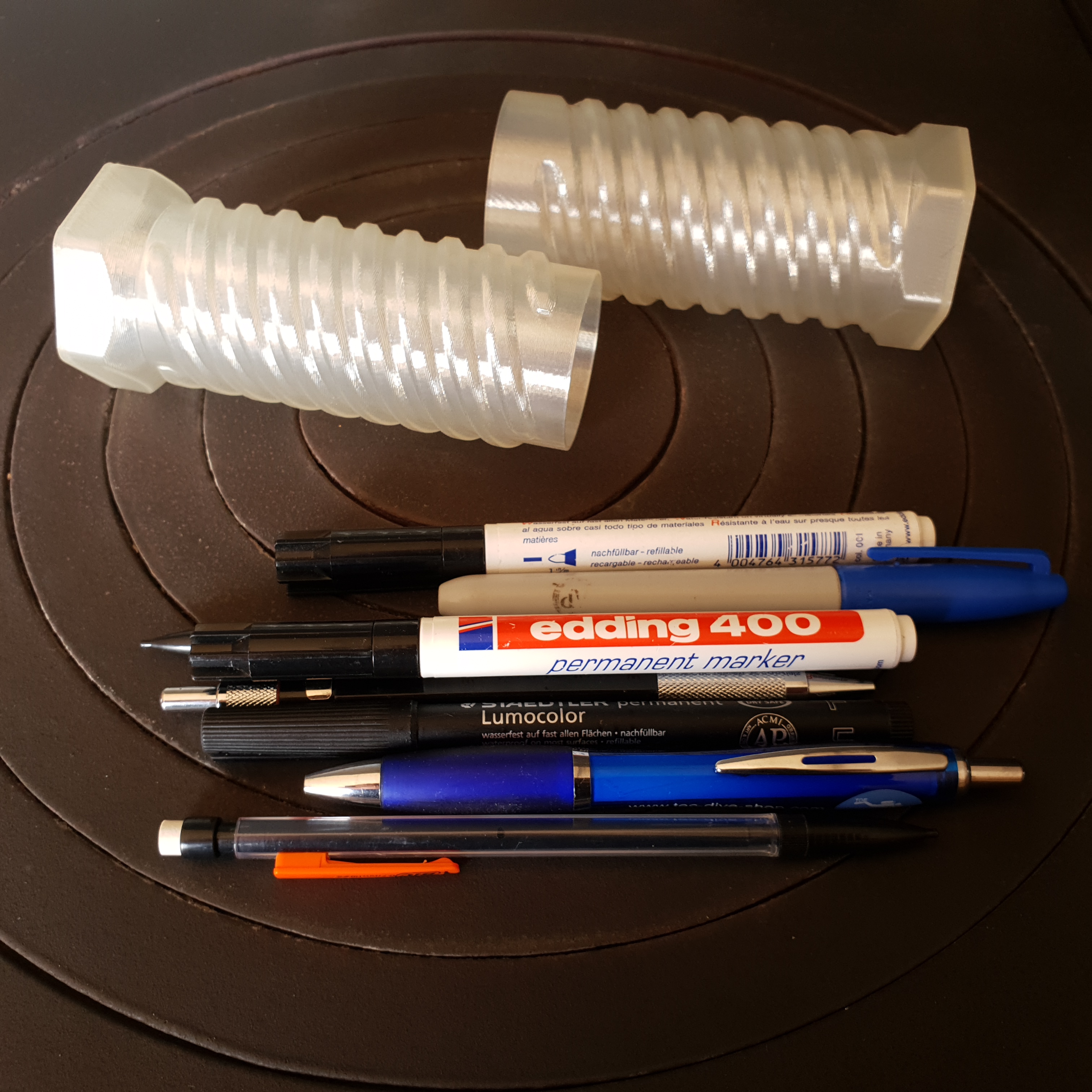 Tube pencil case with hexagonal stand