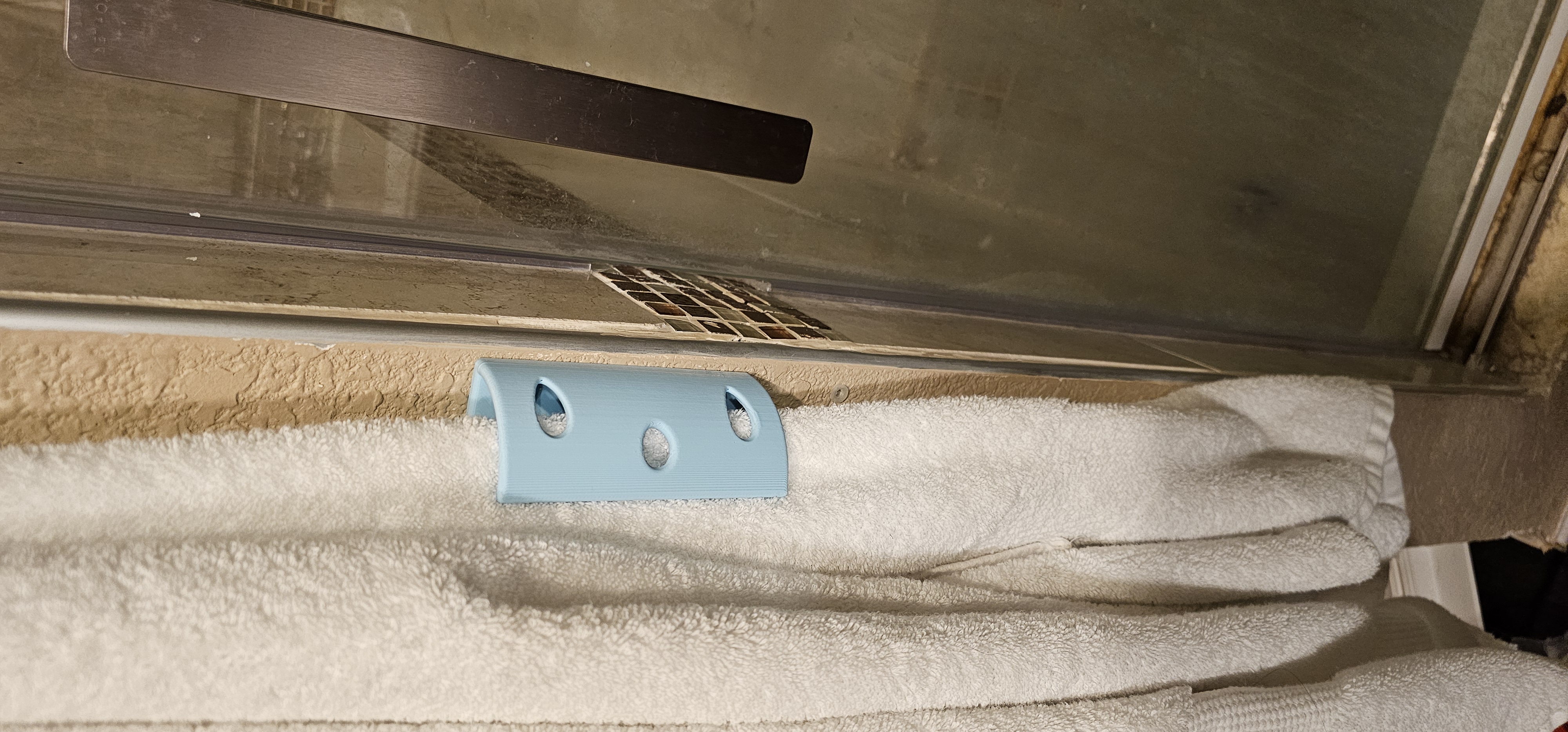 Towel and Cord Hold-Back