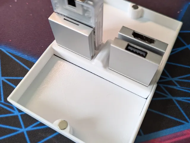 Remix of the Card_Box_v7_Lid with inserts for a 6x1mm magnet