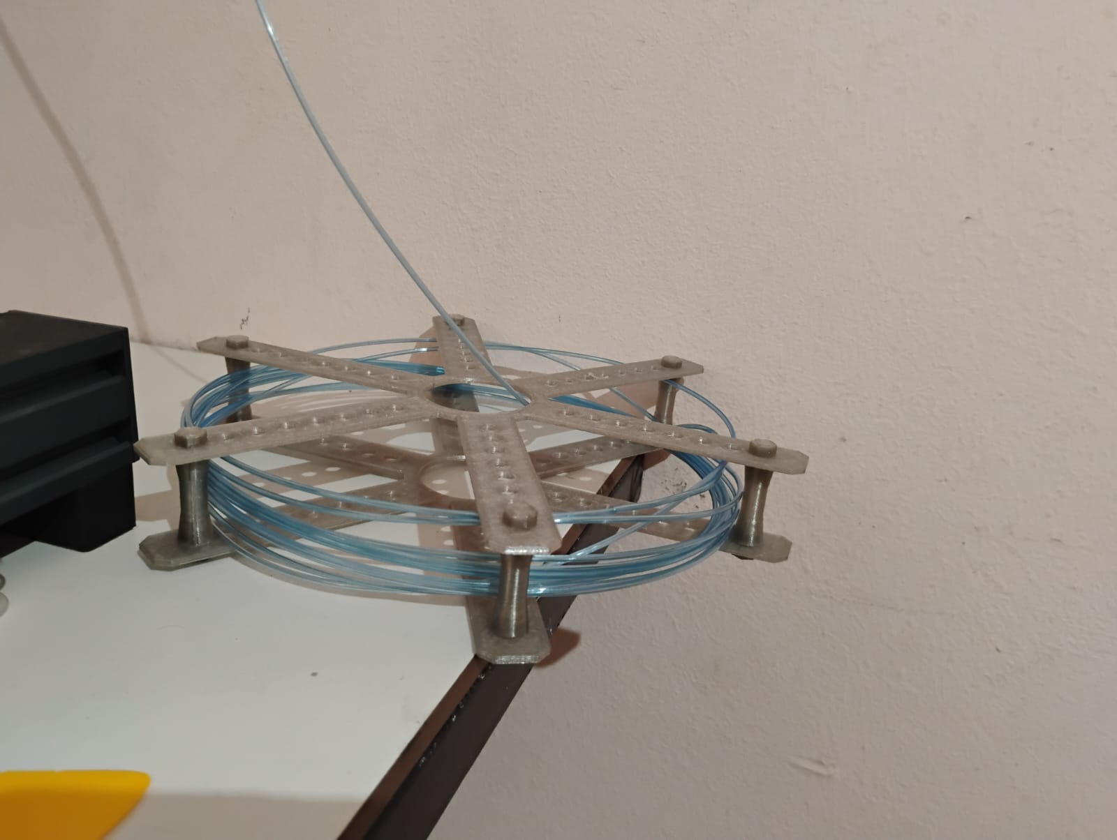 Reverse spool for recycled filament/PET filament