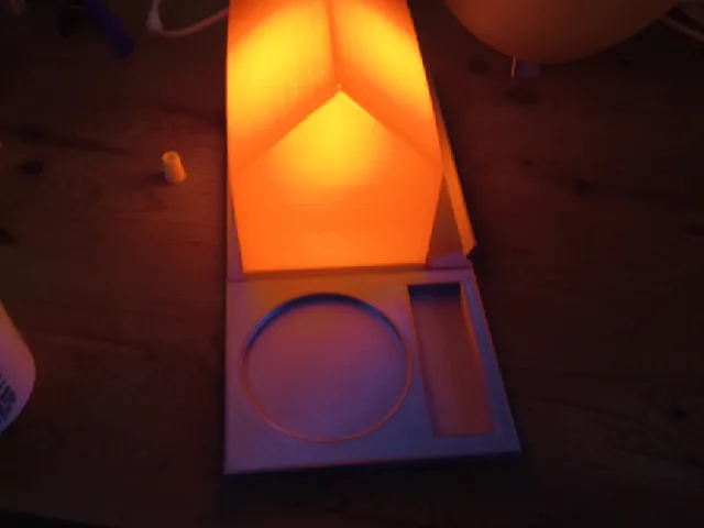 Bedside lamp and book rest remixed. Hue bulb compatible