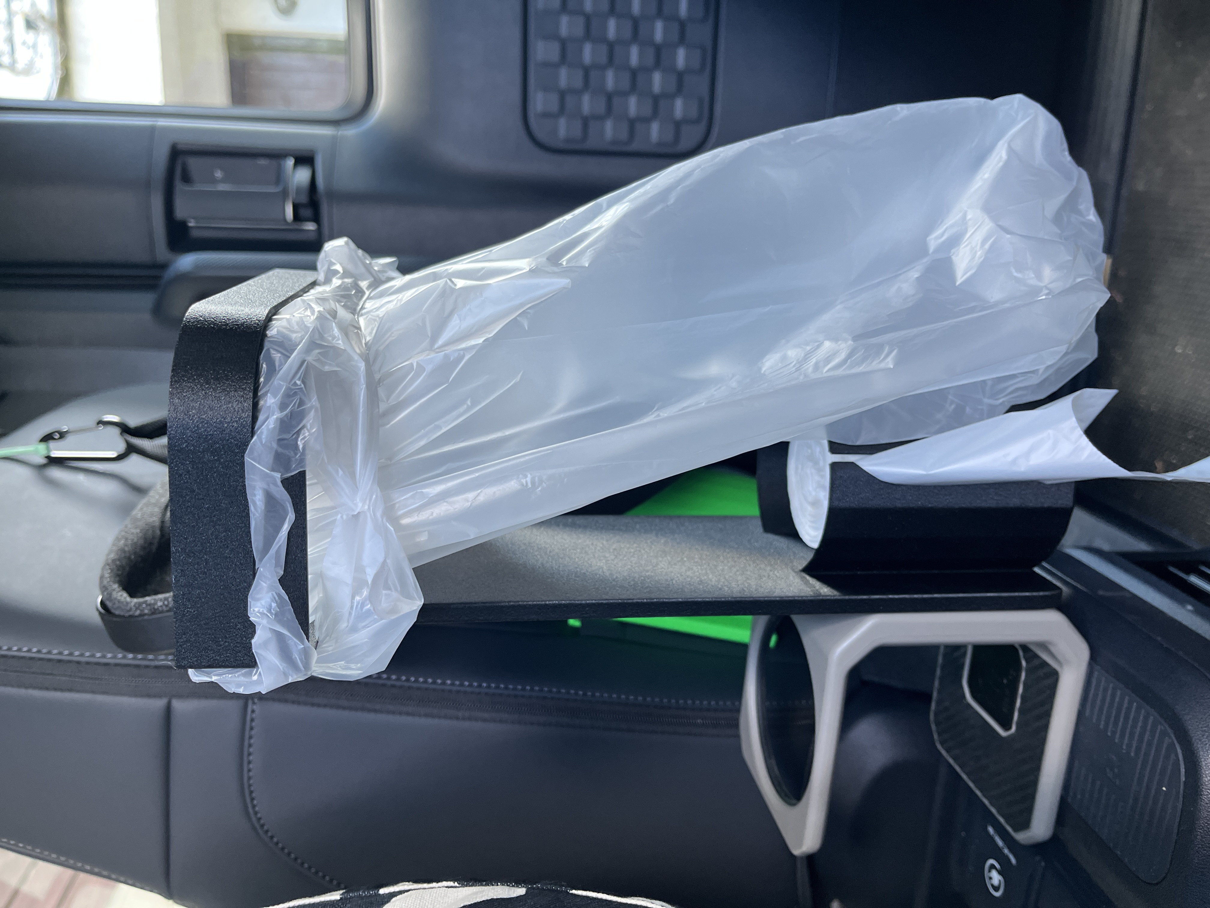 KIA AddGear holder for bin bags and spare bags for the rear seat.