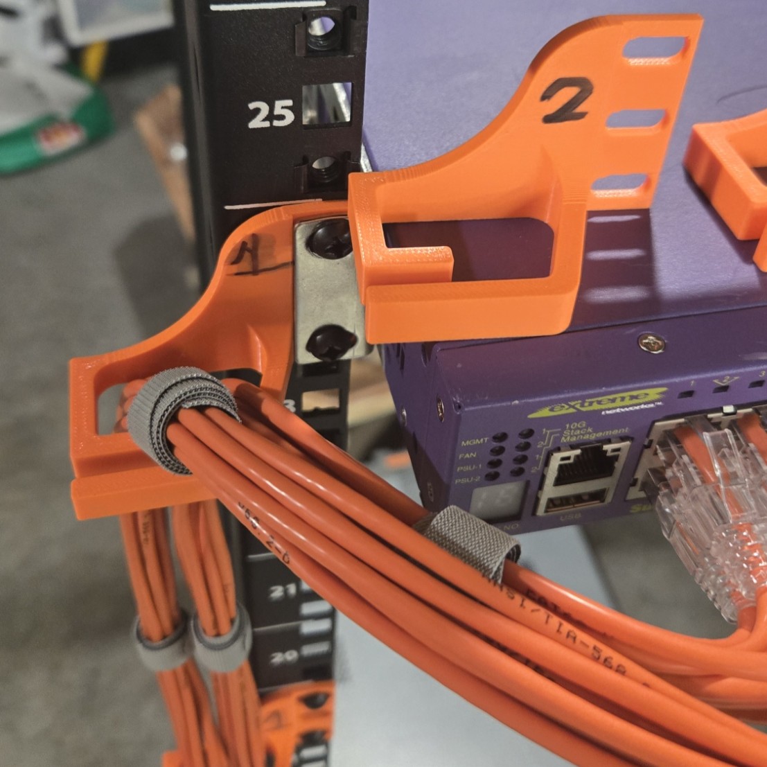 Server rack cable management ring