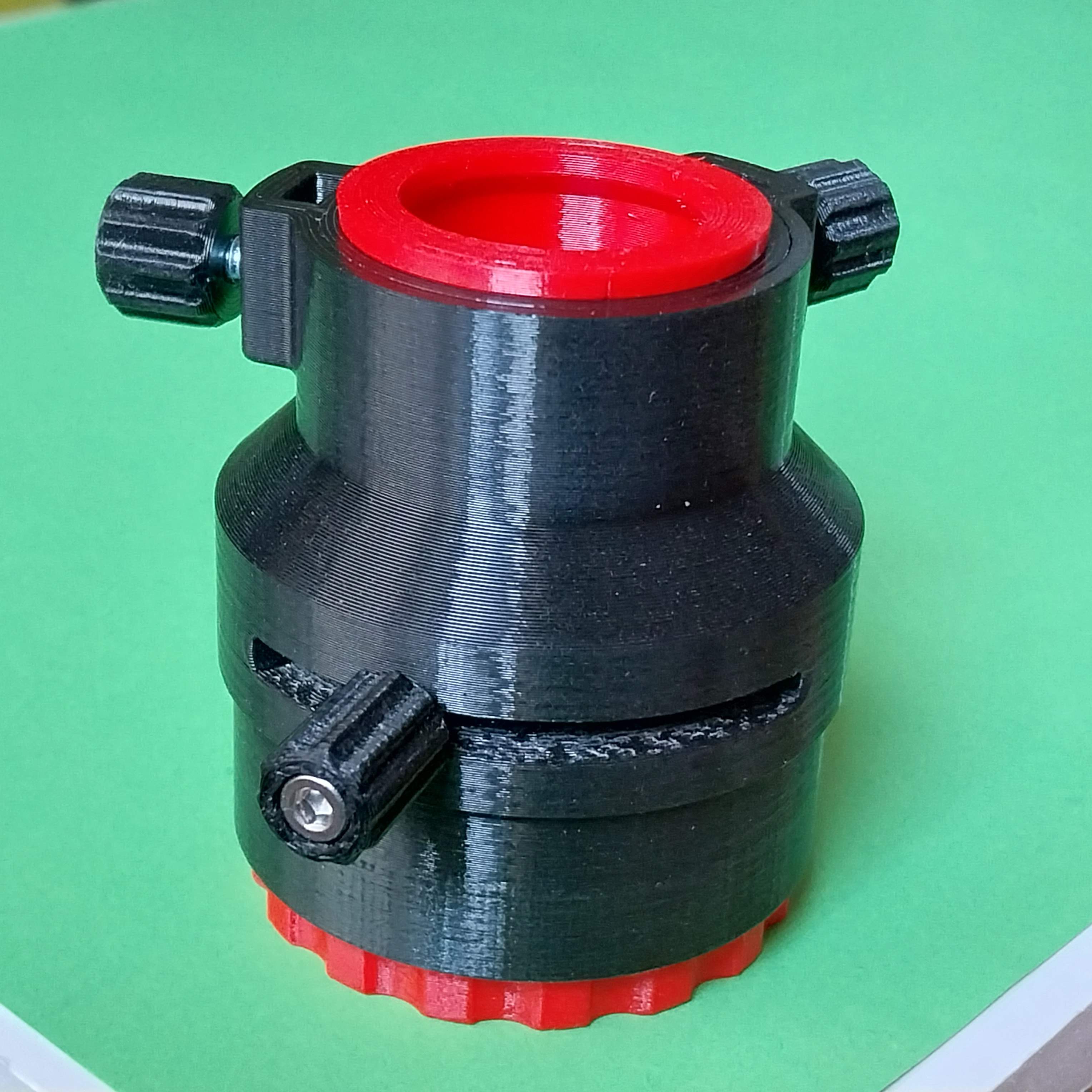 1,25 eyepiece holder with integrated polarization filter.