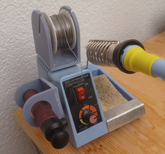 Desoldering pump and spool holder