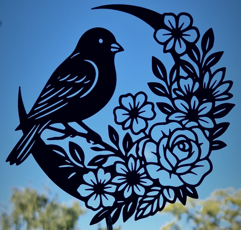 Elegant bird perched on a circular branch