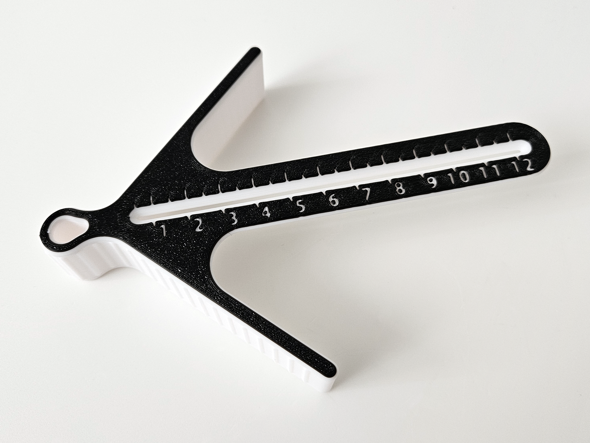 Improved center marker with ruler