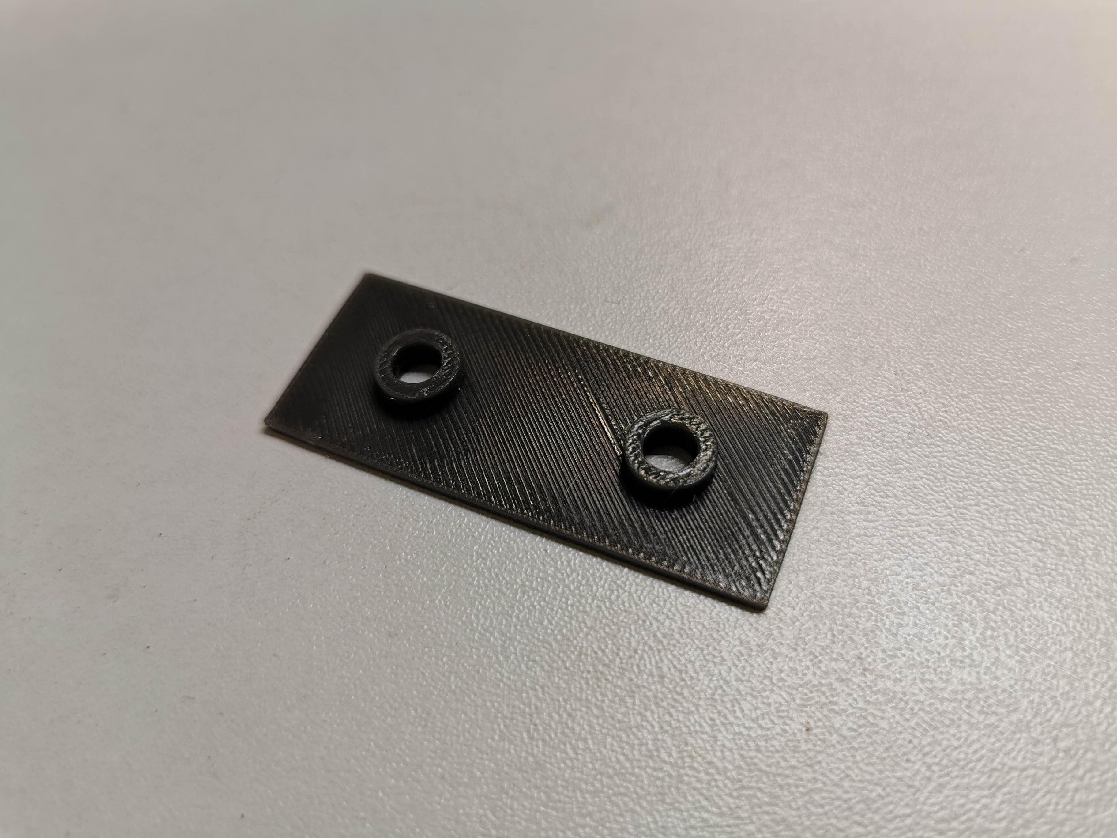 Glass shower door hinge spacer