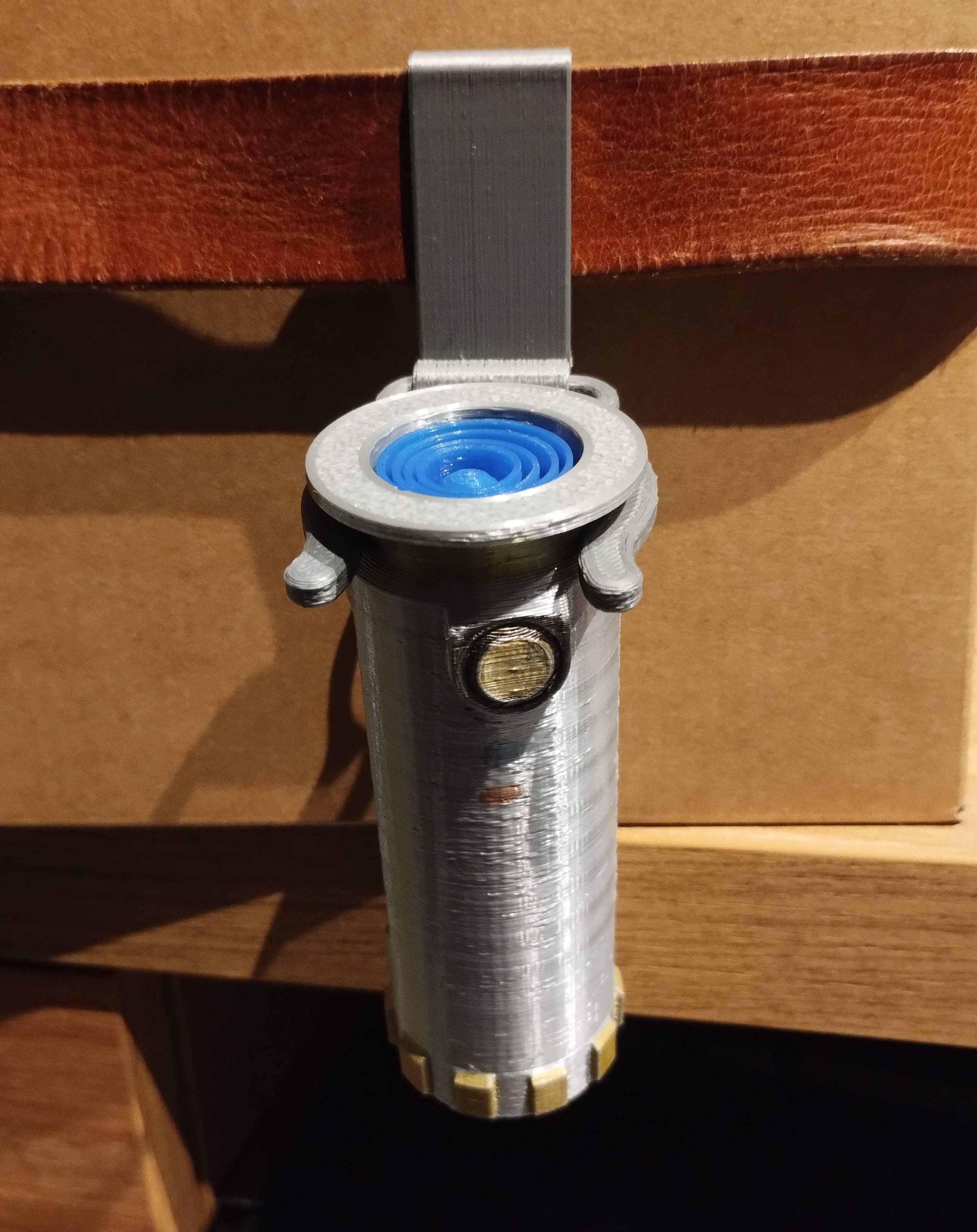 Belt clip for collapsible toy lightsaber