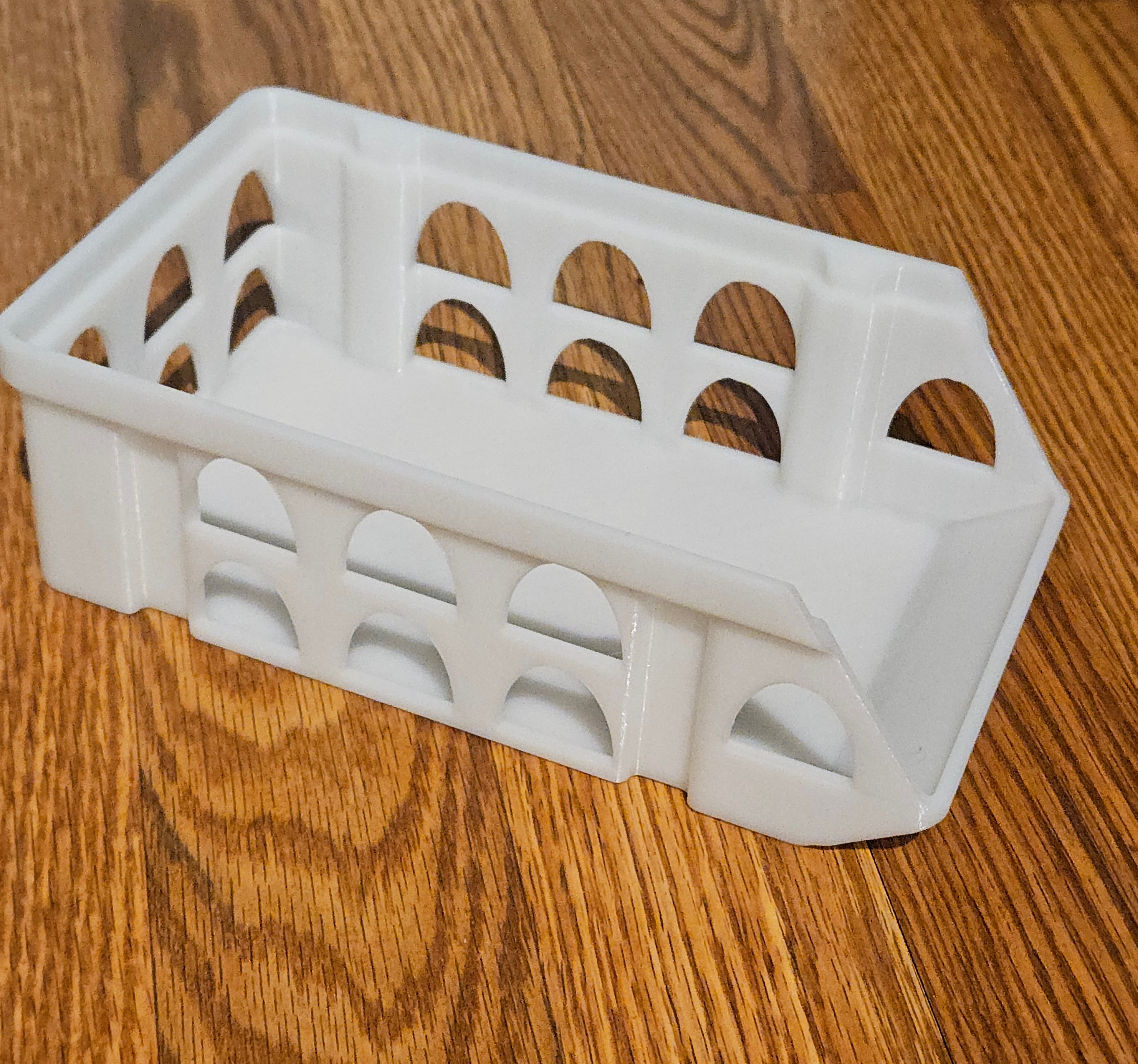 Stackable box with bevel front AND arch cutouts to save filament 3D model thumbnail