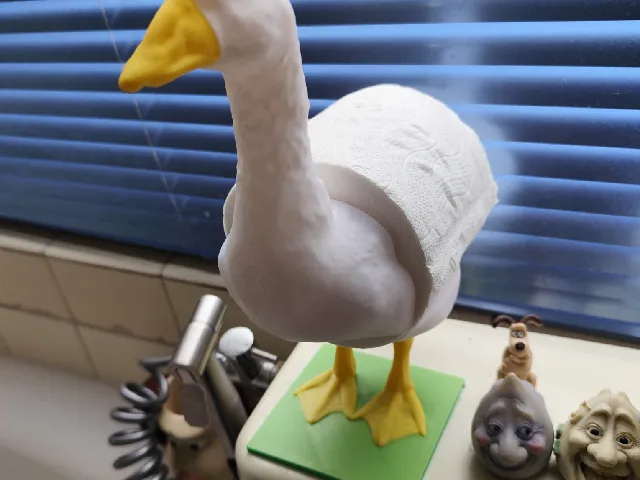 Goose (or ostrich) toilet roll stand