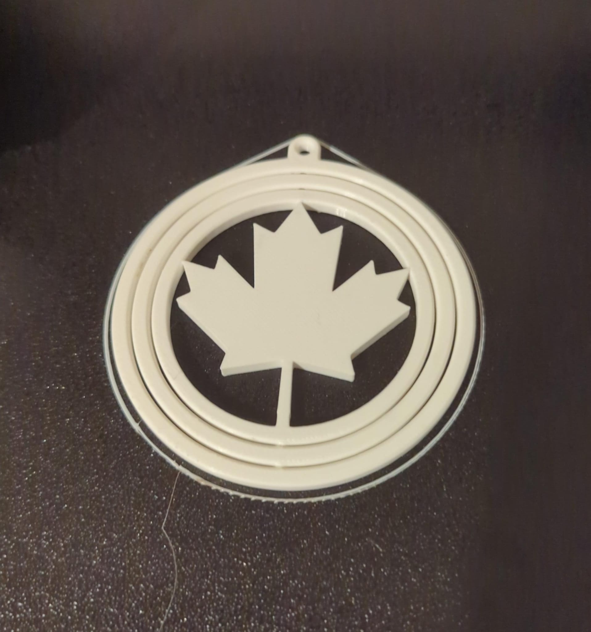Maple Leaf Gyro Christmas Ornament.