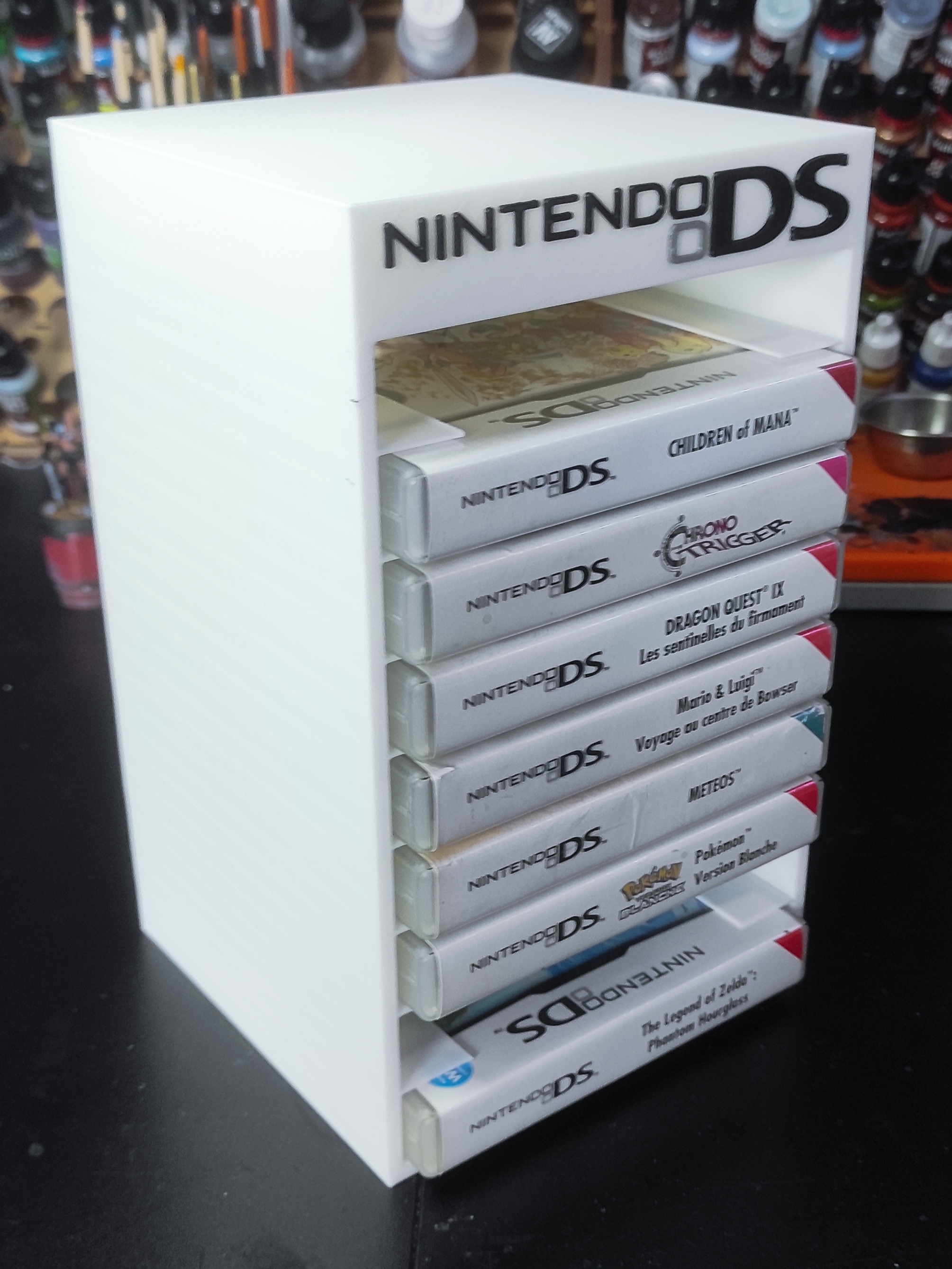 Vertical game stand for Nintendo DS.