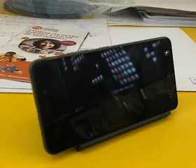Holder for mobile phone.