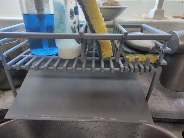 Kitchen Sink Caddy with tilted drain plate