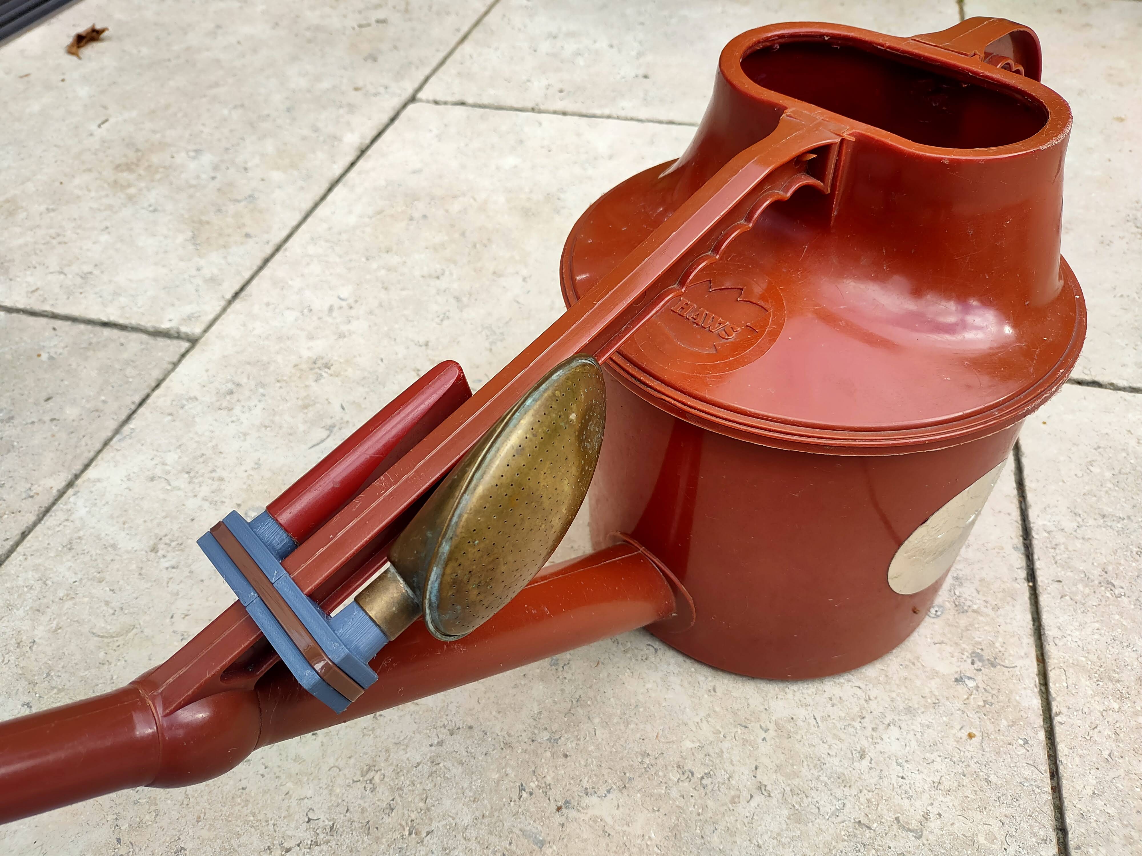 Haws watering can rose holder.